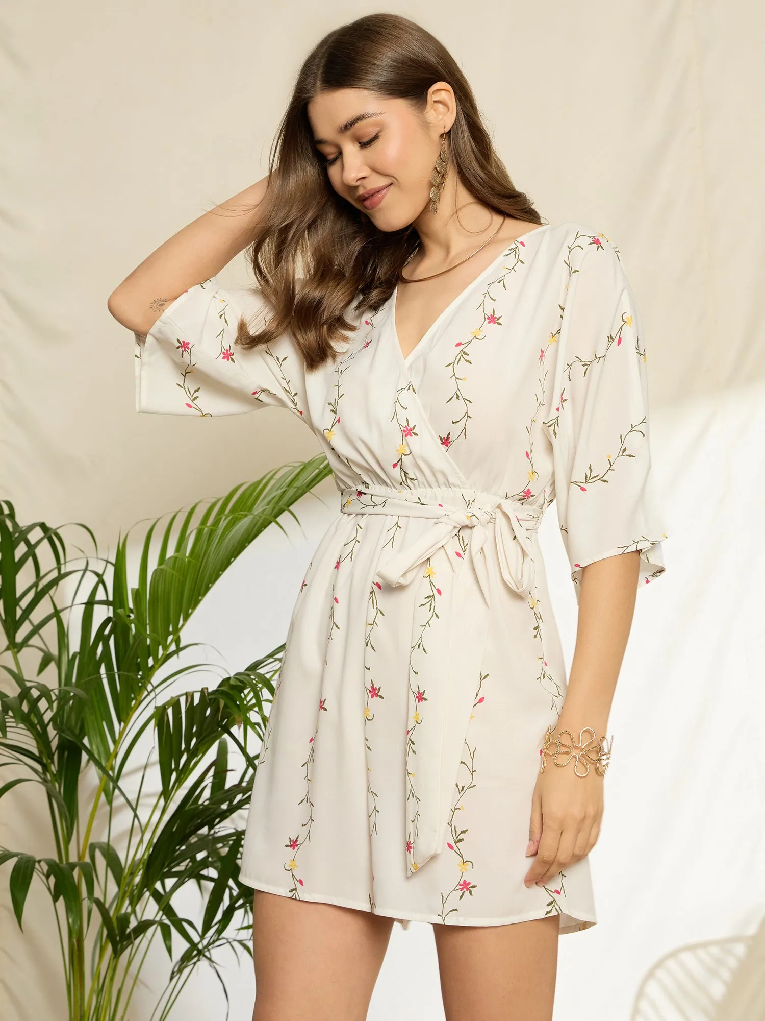 Berrylush Women White Floral Printed V-Neck Three-Quarter Sleeves Waist Tie-Up Wrap Mini Jumpsuit