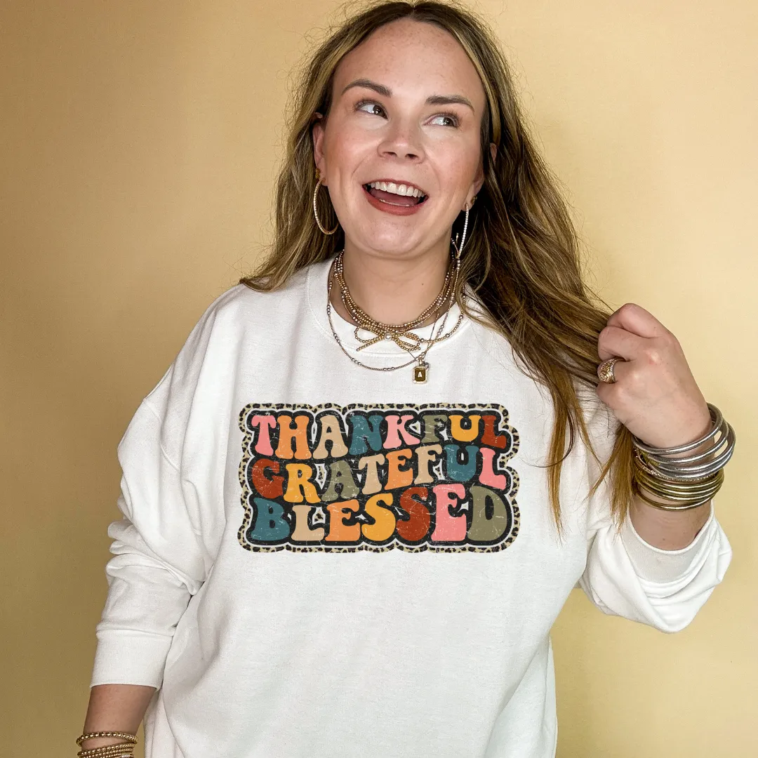 Online Exclusive | Thankful, Grateful, Blessed with Cheetah Print Outline Graphic Sweatshirt in Multiple Color Options